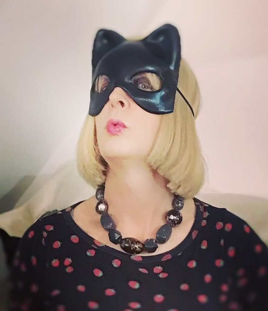 Blonde lady in a cat mask